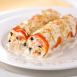 Canelones de rape y langostinos