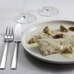 Merluza con champiñones