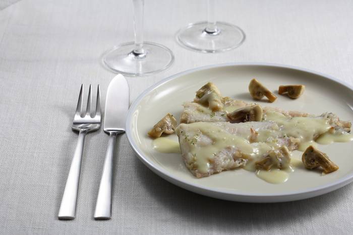 Merluza con champiñones