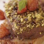 Magret de pato rebozado en pistachos