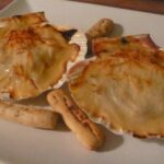 Merluza con gambas en concha de vieira, para auxiliadora