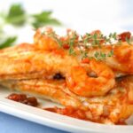 Lomos de pescado con salsa de langostinos y mostaza