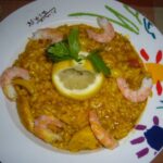 Arroz con pollo y langostinos