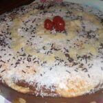 Tarta de chocolate rellena de profiteroles