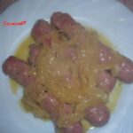 Salchichas encebolladas