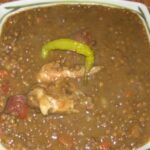 Lentejas con alitas de pollo