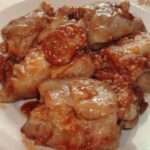 Manitas de cerdo con tomate y un toquecito picante