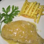 Ventresca de atún encebollado