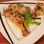 Conejo asado al zumo de naranja