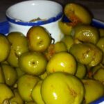 Aceitunas machacadas aliñadas