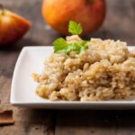 Risotto de manzanas, queso y canela
