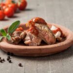 Pollo troceado con tomate