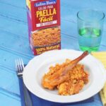 Paella de pollo y conejo