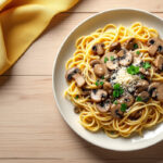 Espaguetis con crema de champiñones